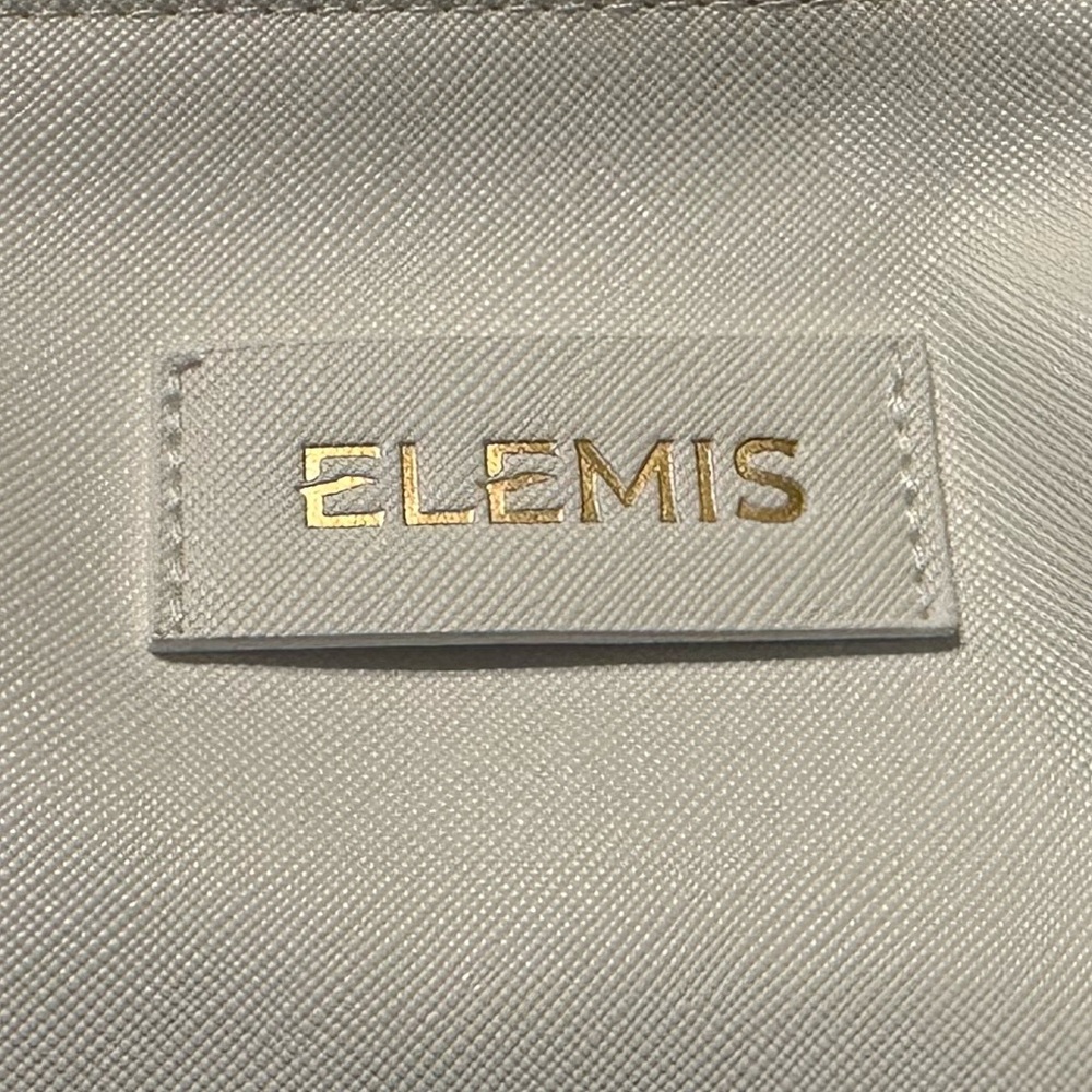ELEMIS Cream Cosmetic Pouch with Gold Logo and Additional Products - Picture 2 of 6